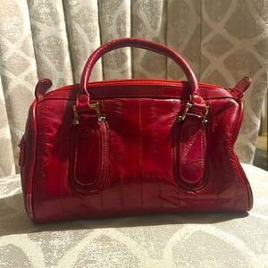 Vintage red eel skin barrel bag